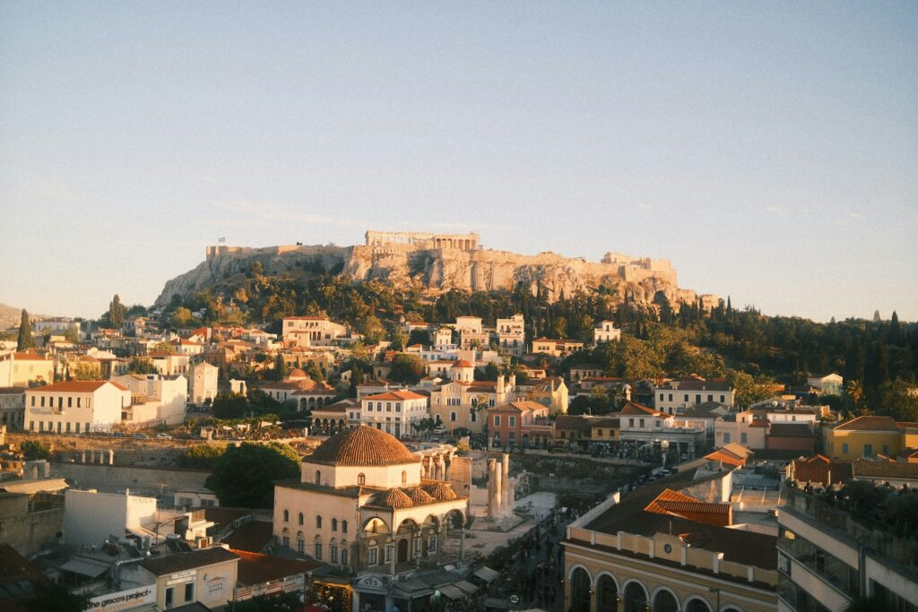 A sunset view of the Acropolis over Monastiraki Square