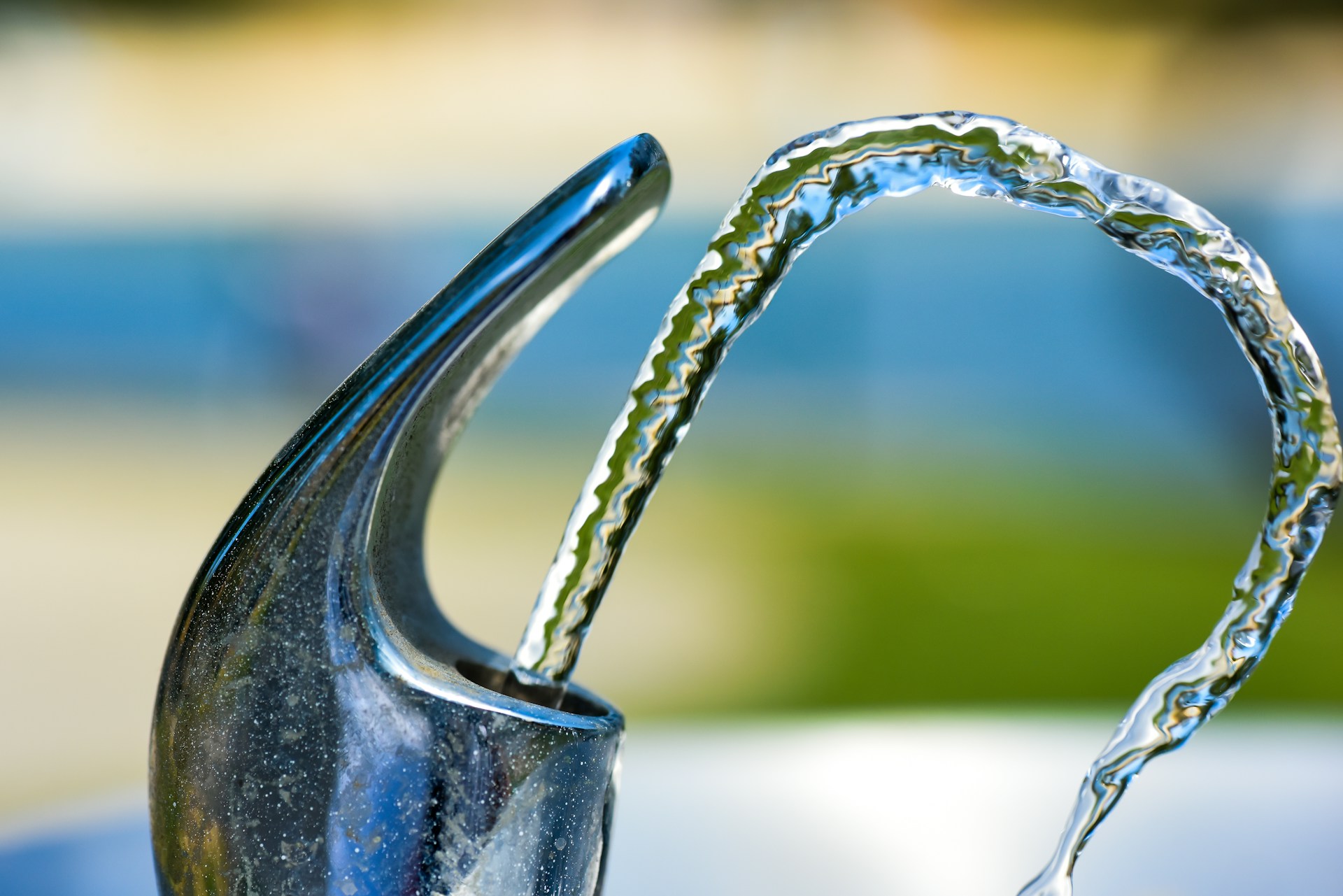 water spraying out of a tap
