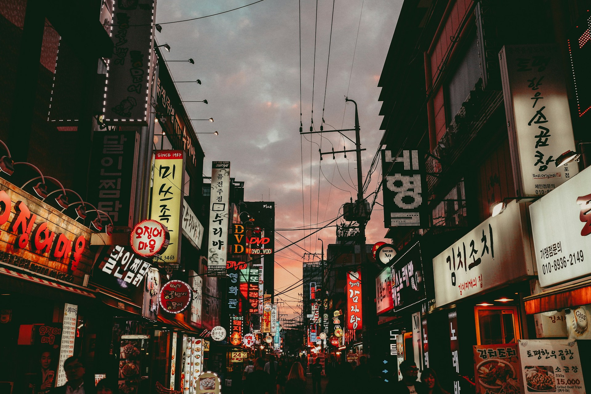 A lively street in Seoul with lots of signage