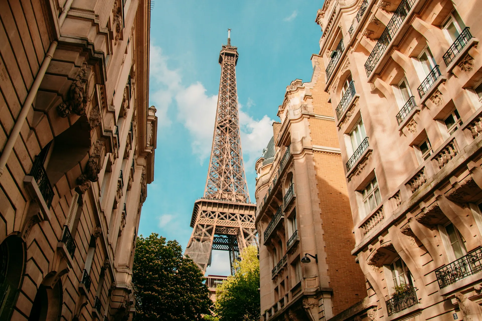 A street in Paris with the Eiffel Tower at the end