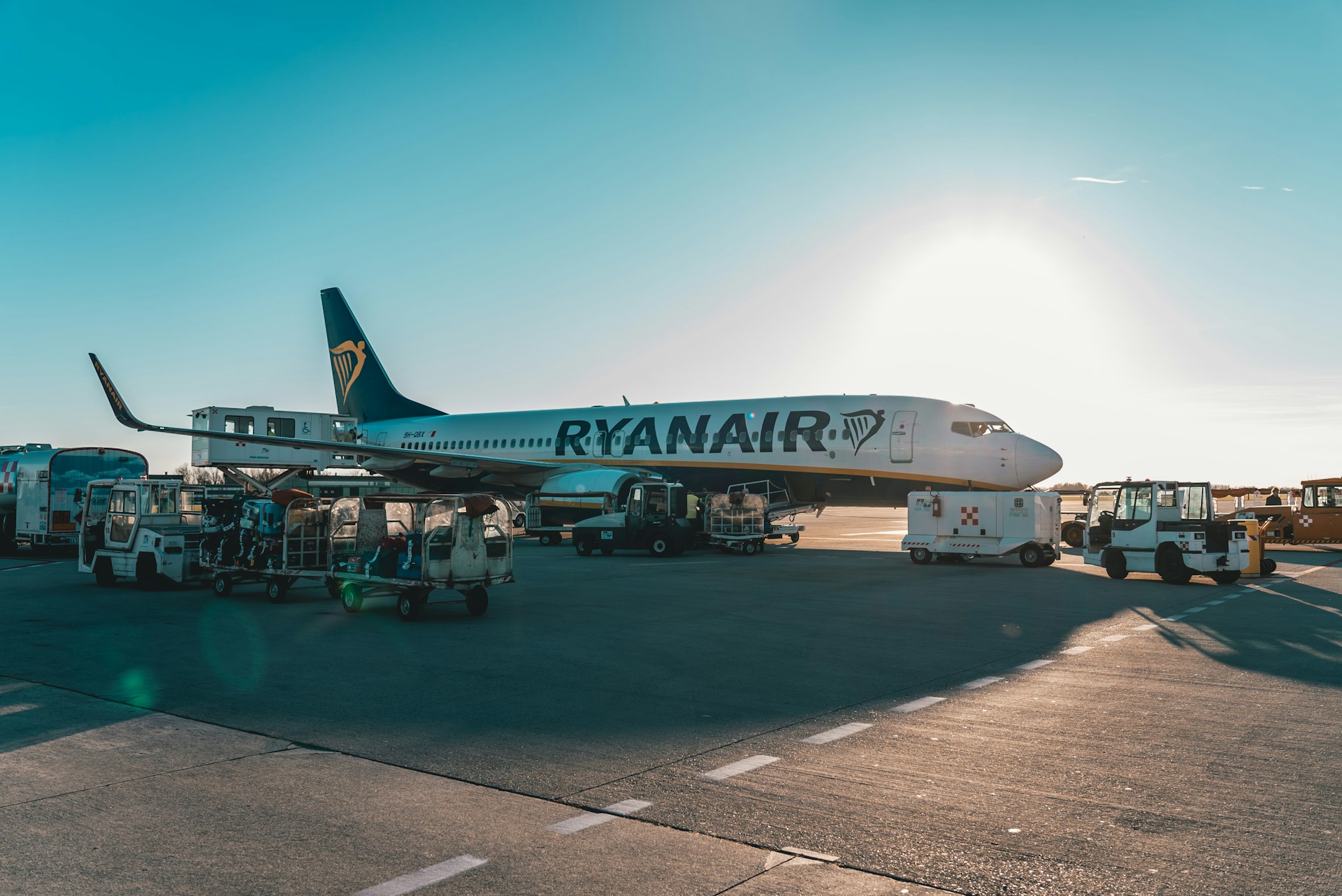 A Ryanair plane at an airport terminal